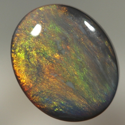 SOLID BLACK OPAL Burning red throught orange and green